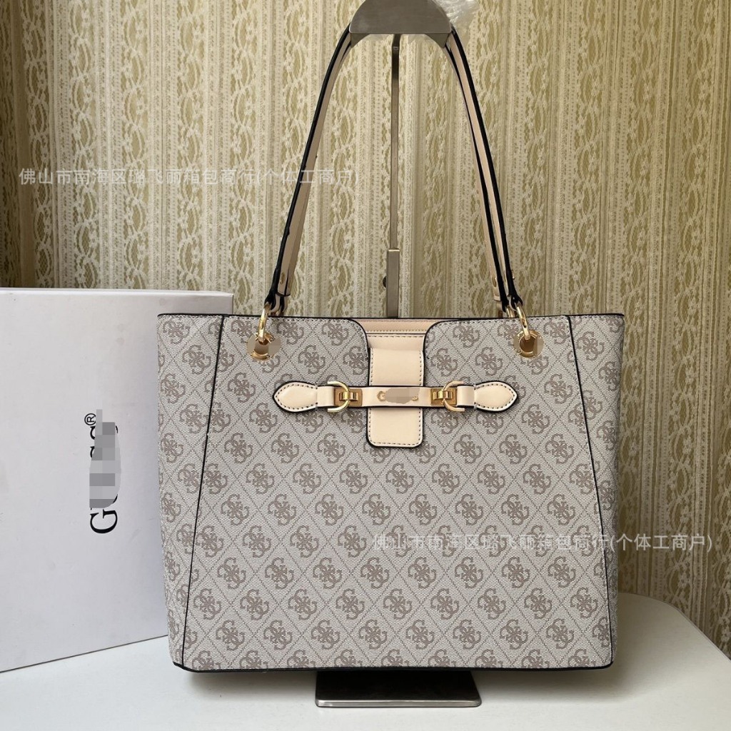 กระเป๋าGuess ทรงโท้ทใบใหญ่ Tote bagกระเป๋าผู้หญิง เก็บโค้ดส่วนลดค่าส่งฟรี (guessโบว์)