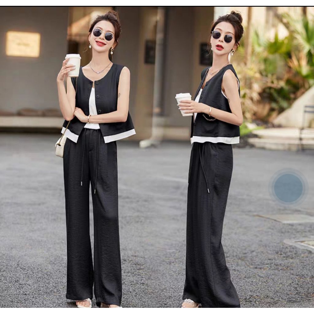 ชุดเซ็ทสูท 2 ชิ้น ผ้าฝ้ายผ้าลินินสไตล์ยุโรป  ทันสมัย ดูอ่อนเยาว์ เสื้อกล้ามไม่มีแขน แมทช์กับกางเกงขายาวขาบานผ้าลินิน
