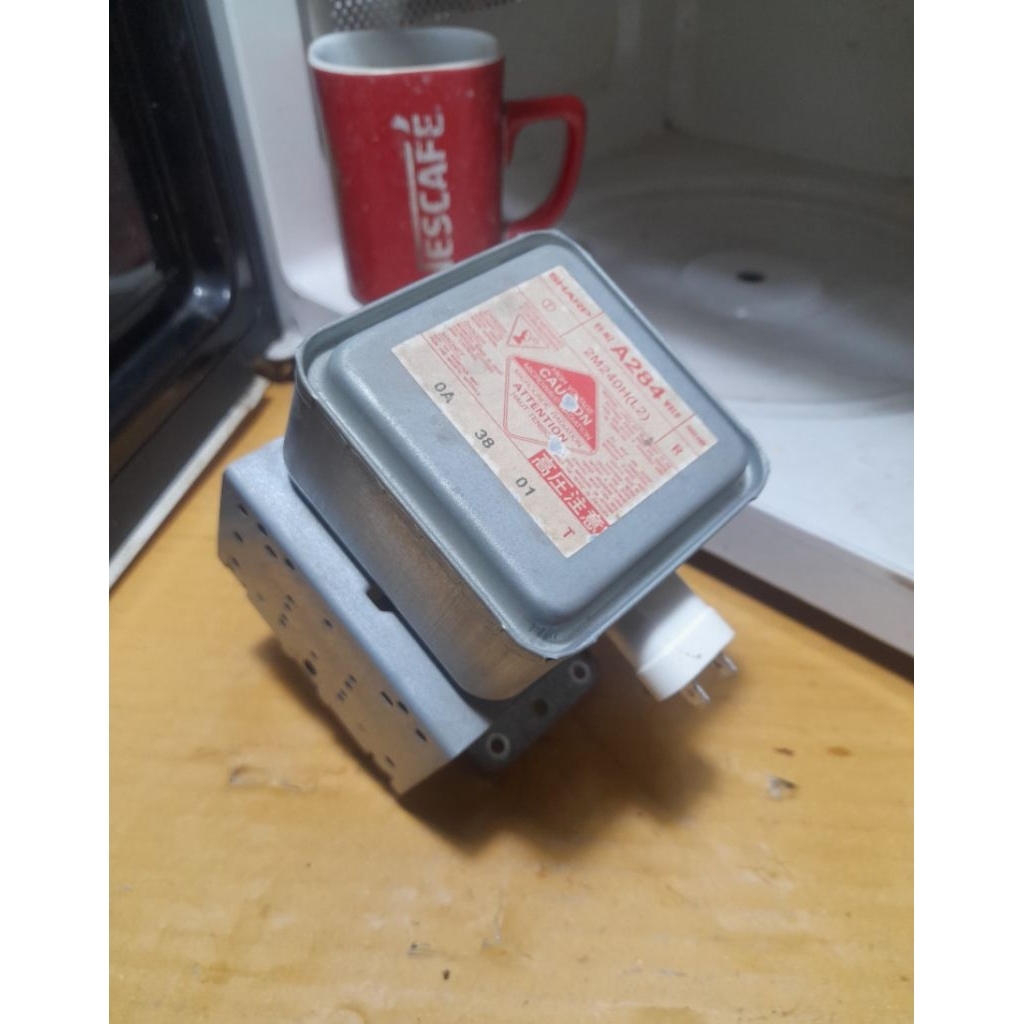 หัวแมคนีตรอนไมโครเวฟ Sharp 2M240H(L2) (รูปถ่ายตัวสินค้าจริง)  มือสองของแท้  ใช้งานได้ปกติ