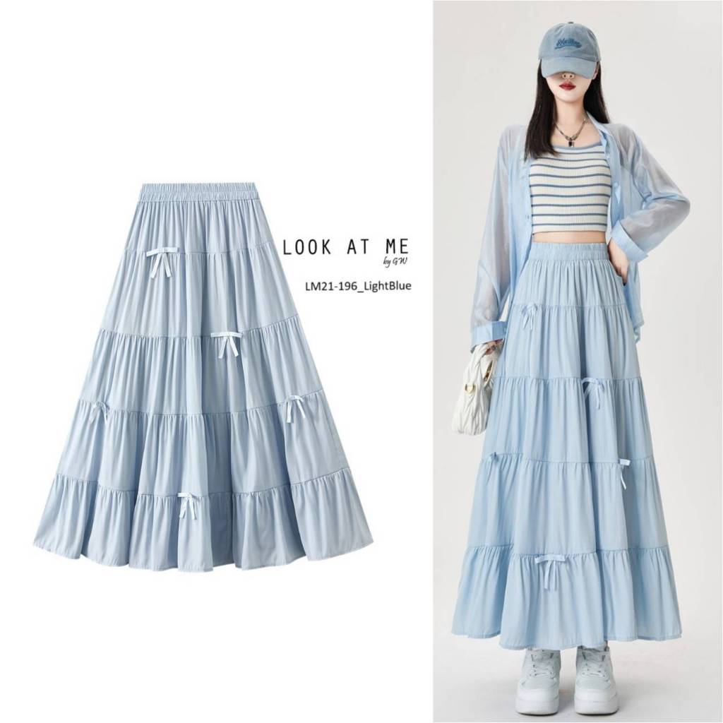 กระโปรงยาวทรงขนมเค้ก ผ้าโพลิเอสเตอร์ใส่สบาย ด้านหน้าแต่งโบว์เล็กๆ มาพร้อมซับในตัว