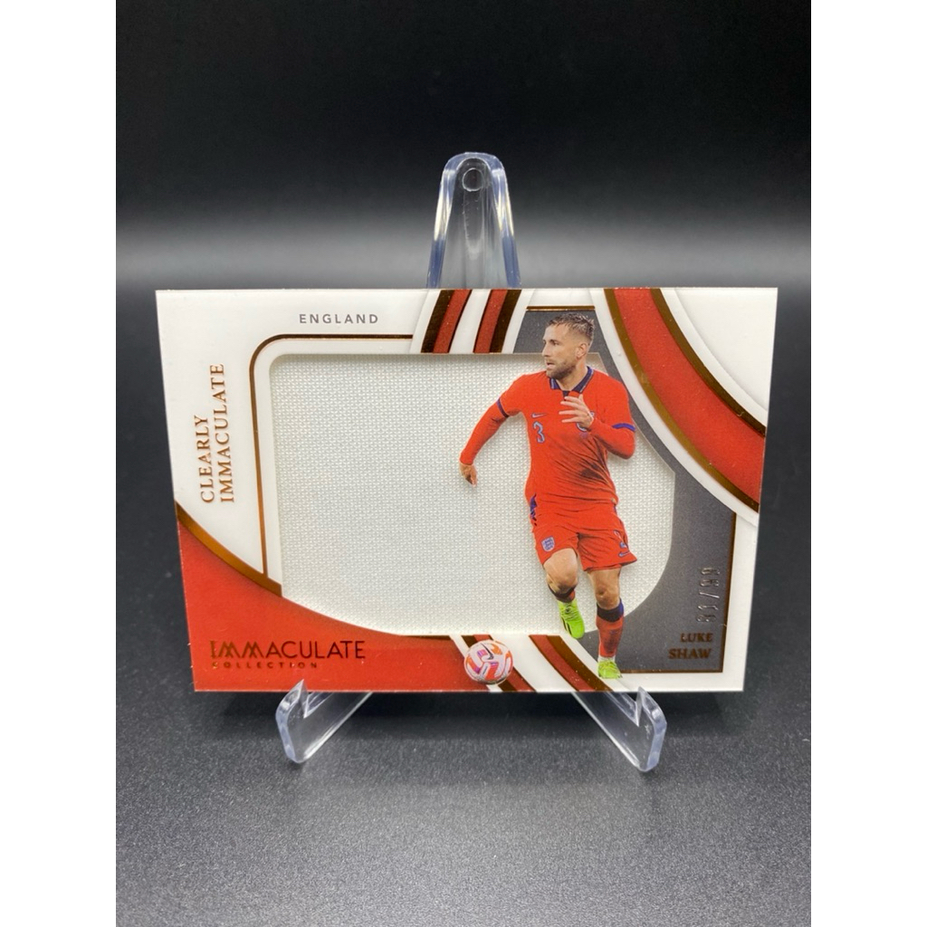 การ์ดฟุตบอล👕ชิ้นส่วนผ้า Luke Shaw | 2022-23 Panini Immaculate Collection – Clearly Immaculate 🏴󠁧󠁢󠁥󠁮󠁧
