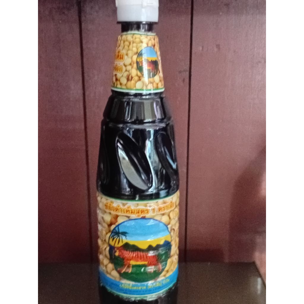 ซีอิ๊วดำเอ็ม ตราเสือ (otop) 1ขวด 620 ml.1 ลัง 12 ขวด