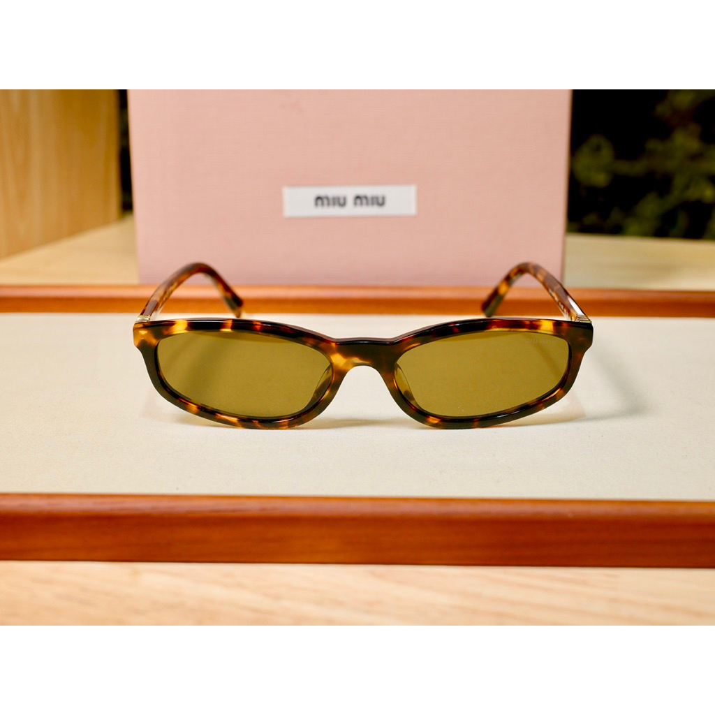 แว่นกันแดด Miu Miu MUA06SF
