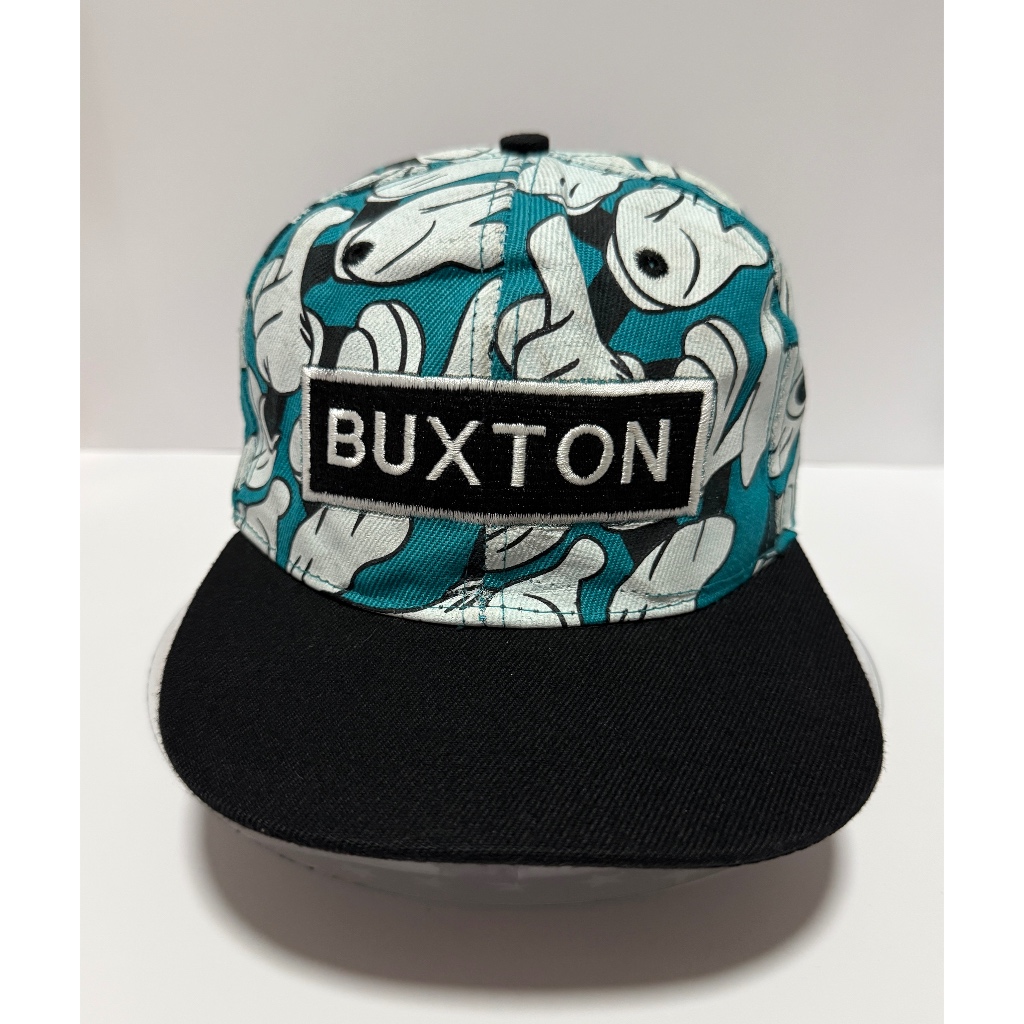 หมวกปีกแบน BUXTON ลายกราฟิกแขนมิกกี้ มือสอง