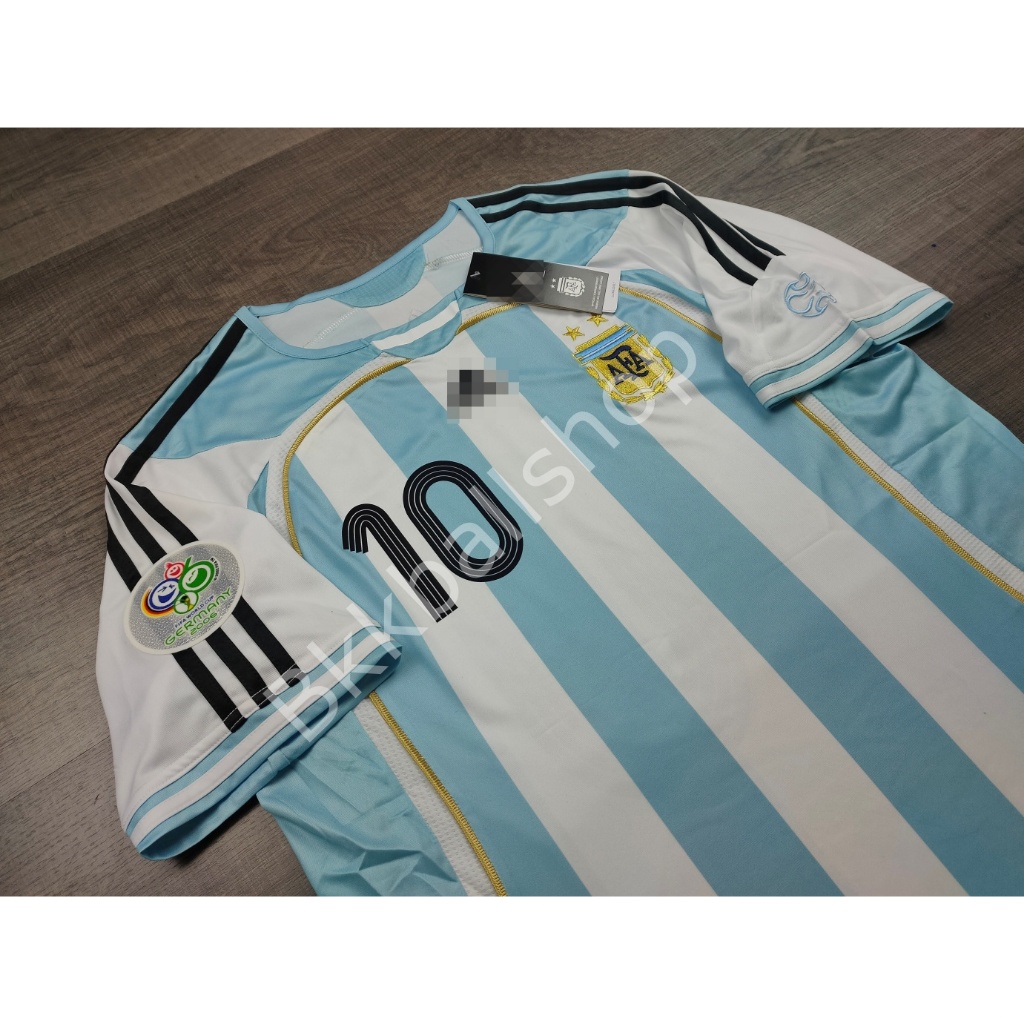 [Retro] – เสื้อฟุตบอล ทีมชาติ อาเจนตินา Home ฟุตบอลโลก ปี 2006 เบอร์ชื่อ 10 RIQUELME 19 MESSI ราคา ถูกที่สุด ดีลบีเคเค แกลเลอรีภาพที่ 3