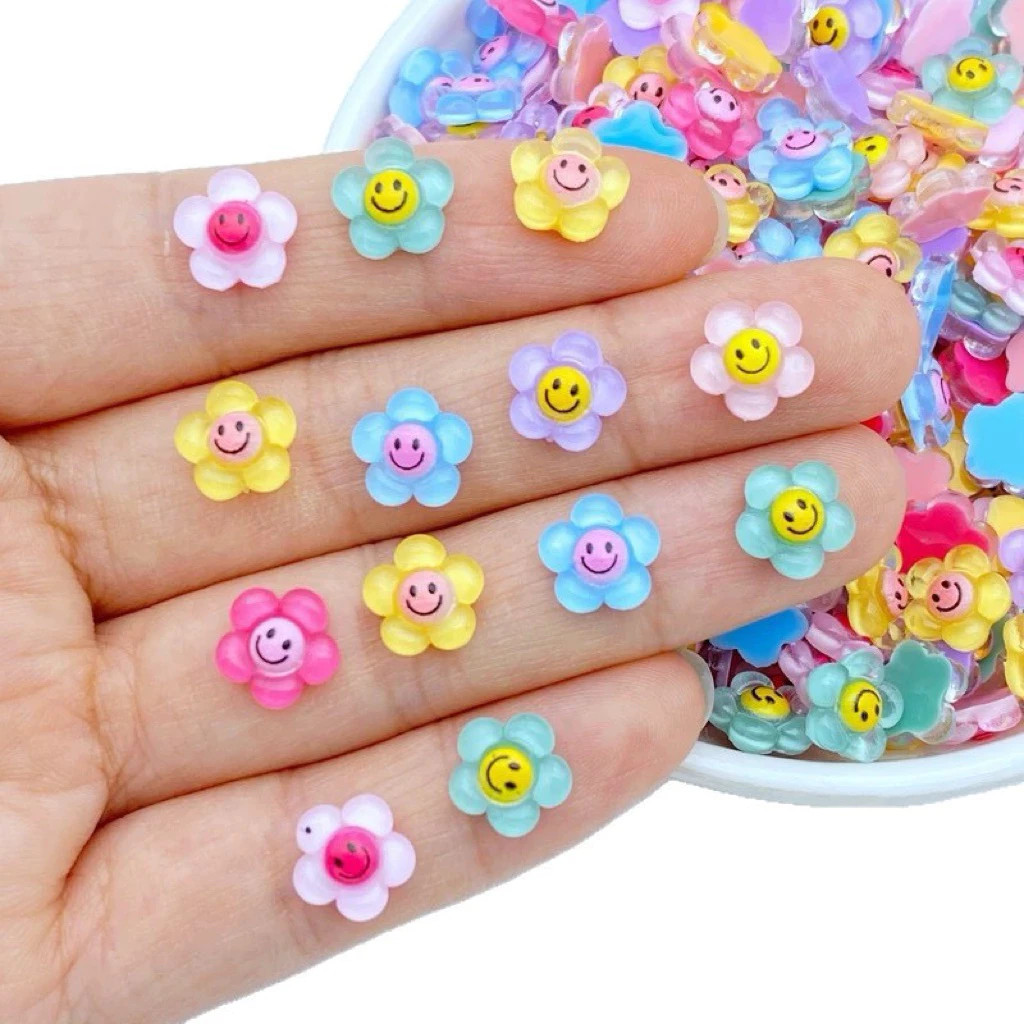 อะไหล่ติดเล็บ ลายดอกไม้หน้ายิ้ม สีสันสดใส น่ารักมากๆ 50ชิ้น/ห่อ สินค้าพร้อมส่งในไทย