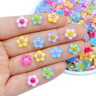 อะไหล่ติดเล็บ ลายดอกไม้หน้ายิ้ม สีสันสดใส น่ารักมากๆ 50ชิ้น/ห่อ สินค้าพร้อมส่งในไทย