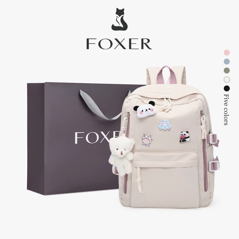 FOXER กระเป๋านักเรียนเรียบง่ายและน่ารัก กระเป๋านักเรียน กระเป๋านักเรียนที่ทนทานและจุของได้เยอะ