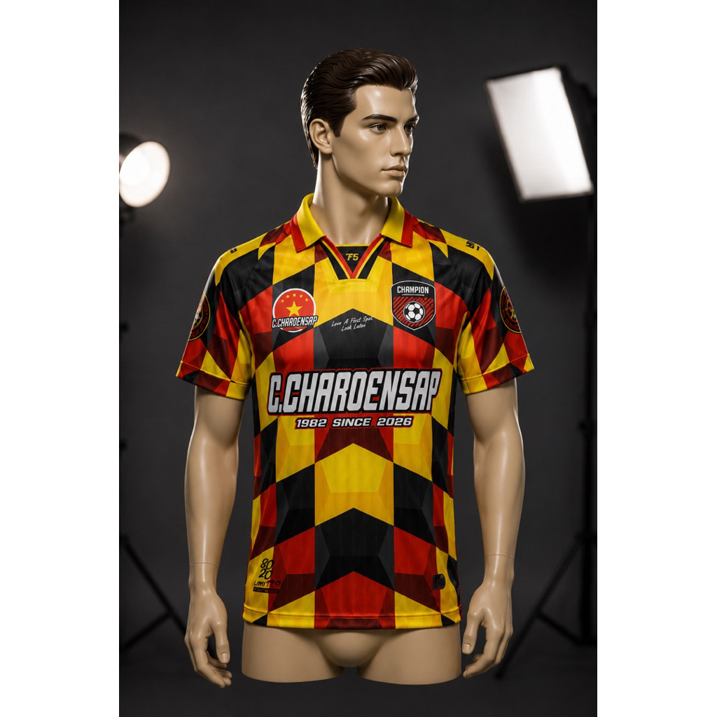 เสื้อกีฬาพิมพ์ลาย คอปก ลายสีเหลืองแดงดำ ผ้าลายขีด ทีม CHAMPION