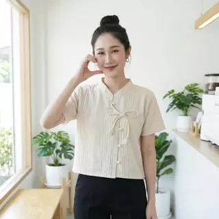เสื้อผ้าฝ้ายด๊อบบี้ ผูกโบว์ดอกทิวลิป เนื้อนุ่มใส่สบาย ตัวผ้าทอลายนูนมีเอกลักษณ์