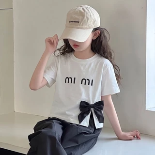 เสื้อยืดเด็กผู้หญิงสไตล์เกาหลี ดีไซน์ผ่าข้างและตกแต่งด้วยโบว์นูน 3 มิติ สวยเก๋ แมตช์ง่าย น่ารัก และทันสมัย