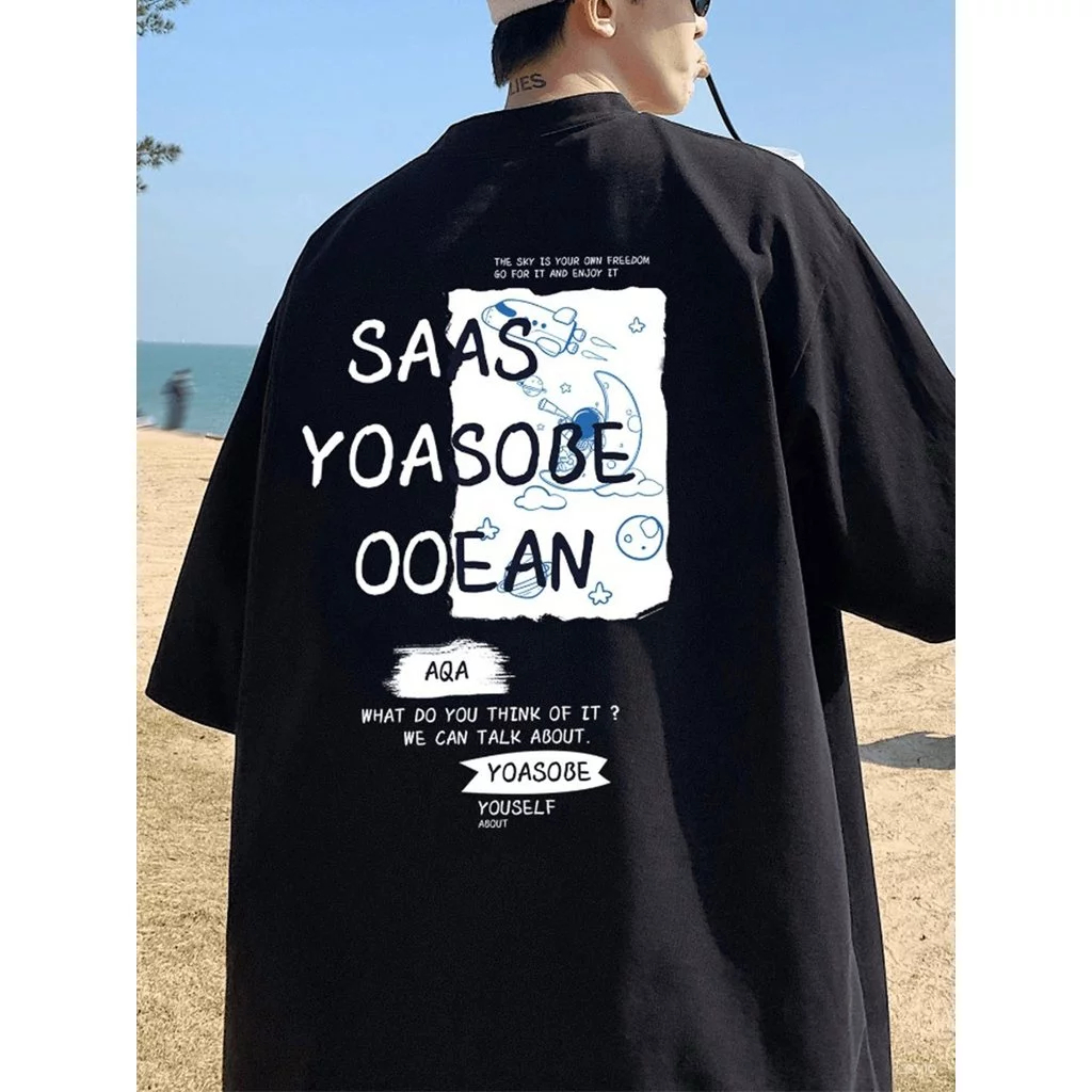 เสื้อยืดผู้ชายทรงโอเวอร์ไซซ์ สีดำลายนักบินอวกาศด้านหลัง ผ้าฝ้ายสไตล์ฮาราจูกุ สตรีทแวร์ใส่ประจำวัน