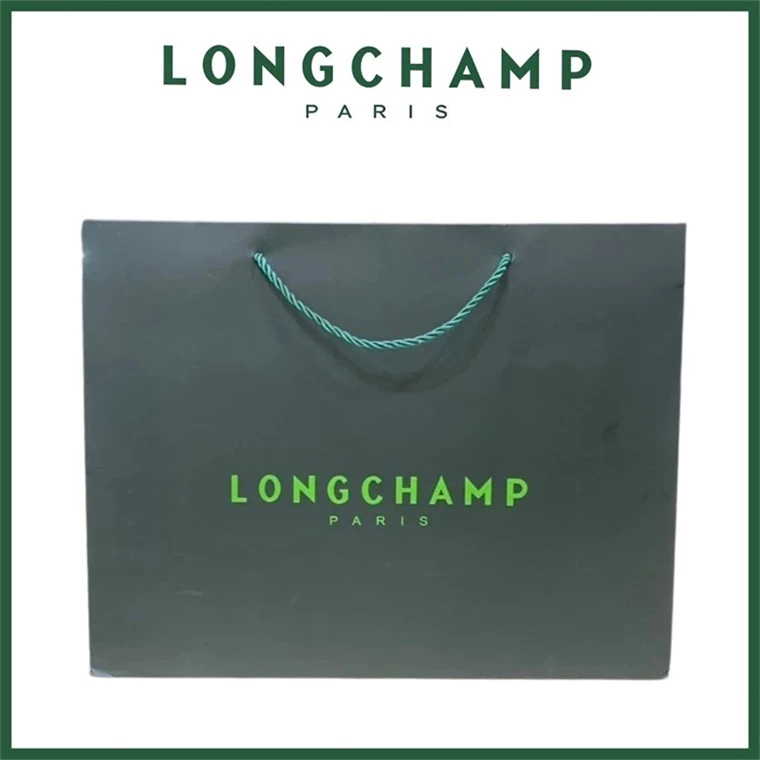 ถุงกระดาษของ Longchamp จะแถมให้ฟรีเมื่อซื้อกระเป๋าที่ตรงกับรุ่นสินค้า