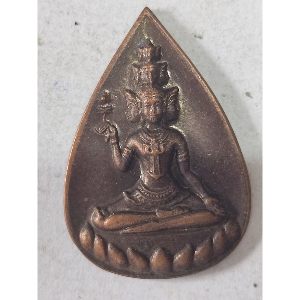 เหรียญหยดน้ำพระเศรษฐีนวโกฏิ รุ่นอุดมทรัพย์อุดมปัญญา ขนาด 2.2 x 3.2 สวยมาก
