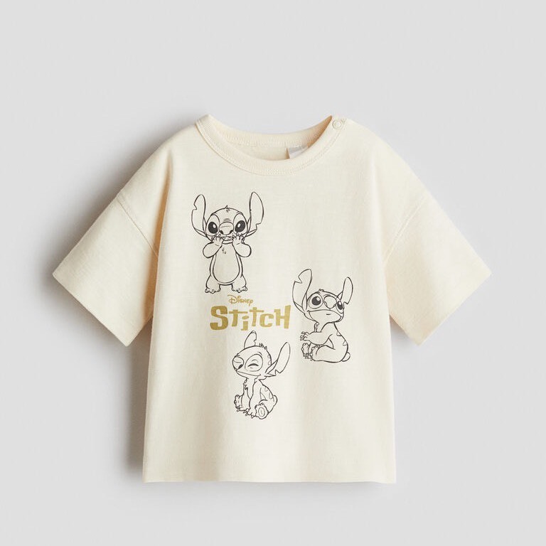 H&M เสื้อสีครีม ผ้าคอตตอล มีกระดุมคอ ลายปริ้น ไซด์ 12-18 เดือน /1.5-2 ปี