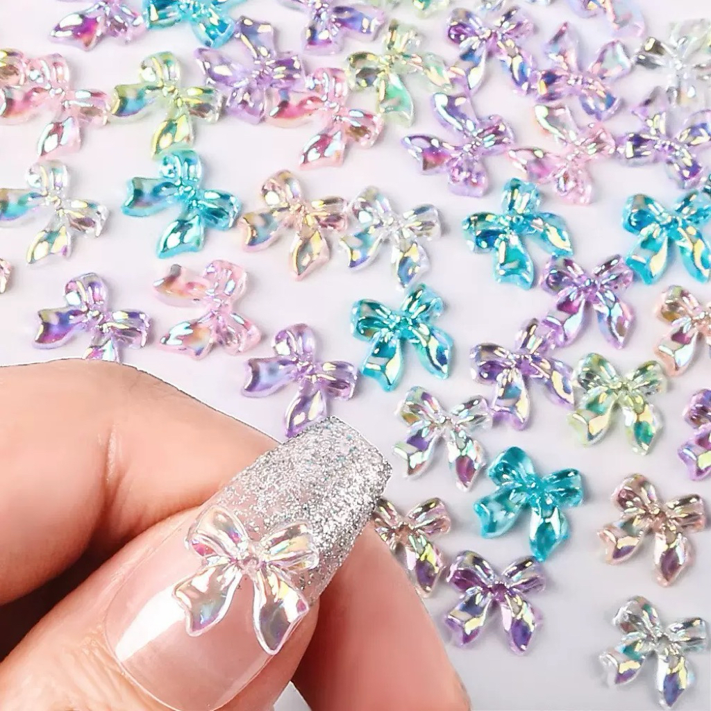 อะไหล่ติดเล็บโบว์ออโรร่าน้ำแข็งสีโปร่งใสผสม 100ชิ้น/ห่อ สินค้าพร้อมส่ง