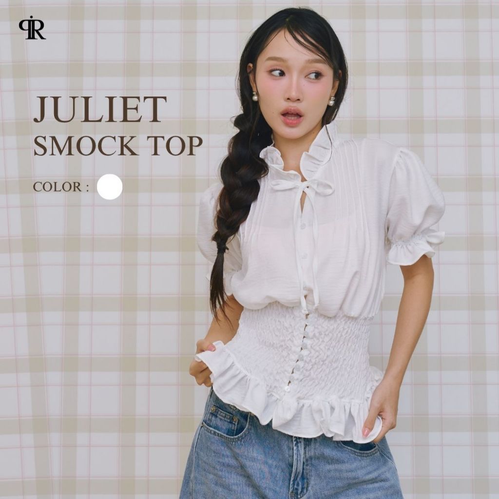 Panchitar Juliet Smock Top – เสื้อแขนสั้นสีขาวดีไซน์คอระบายและโบว์ด้านหน้า พร้อมช่วงเอวสม็อคเข้ารูปและชายระบาย