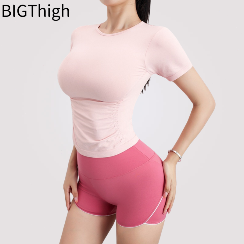 Big Thigh เสื้อกีฬาถักทรงสลิมฟิตแขนสั้นระบายอากาศได้ดีสำหรับฟิตเนสโยคะสำหรับผู้หญิง