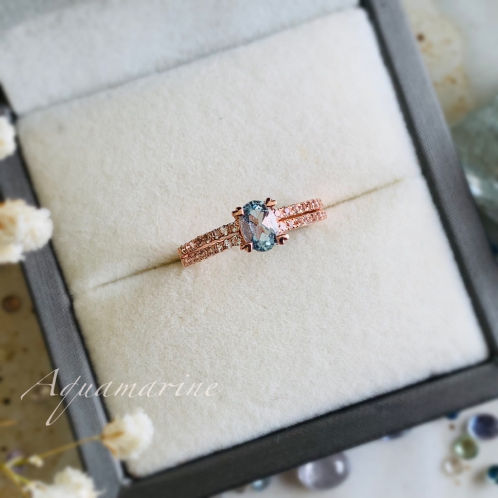 แหวนพลอยอความารินสีฟ้าอ่อน เจียระไนทรงไข่ 4x6 mm.ก้านแหวนฝังพลอยเพทายขาว