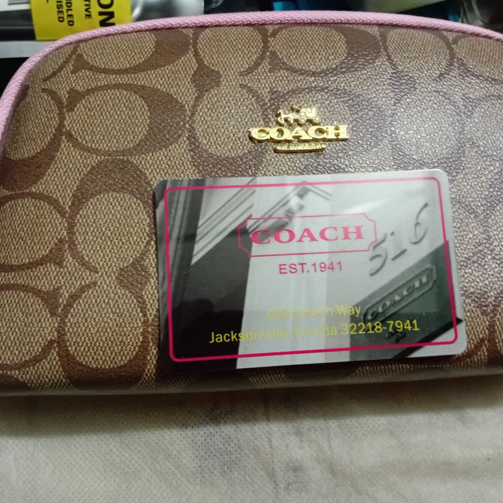 กระเป๋าตังค์ผู้หญิงแบบยาวcoachของแท้ปี1941มือ1พร้อมซองใส่ขอบสีชมพูลายสีน้ำตาลสินค้ายังไม่เคยถูกใช้งา
