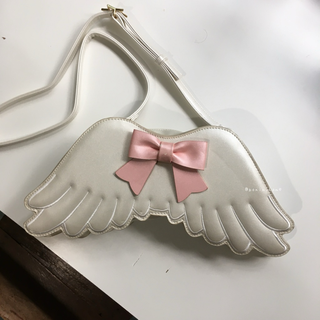 กระเป๋าถือ,สะพายไหล่,สะพายหลังปีกนางฟ้าแต่งโบว์สีขาวมุกสวยมาก 🎀🤍 coquette dollette