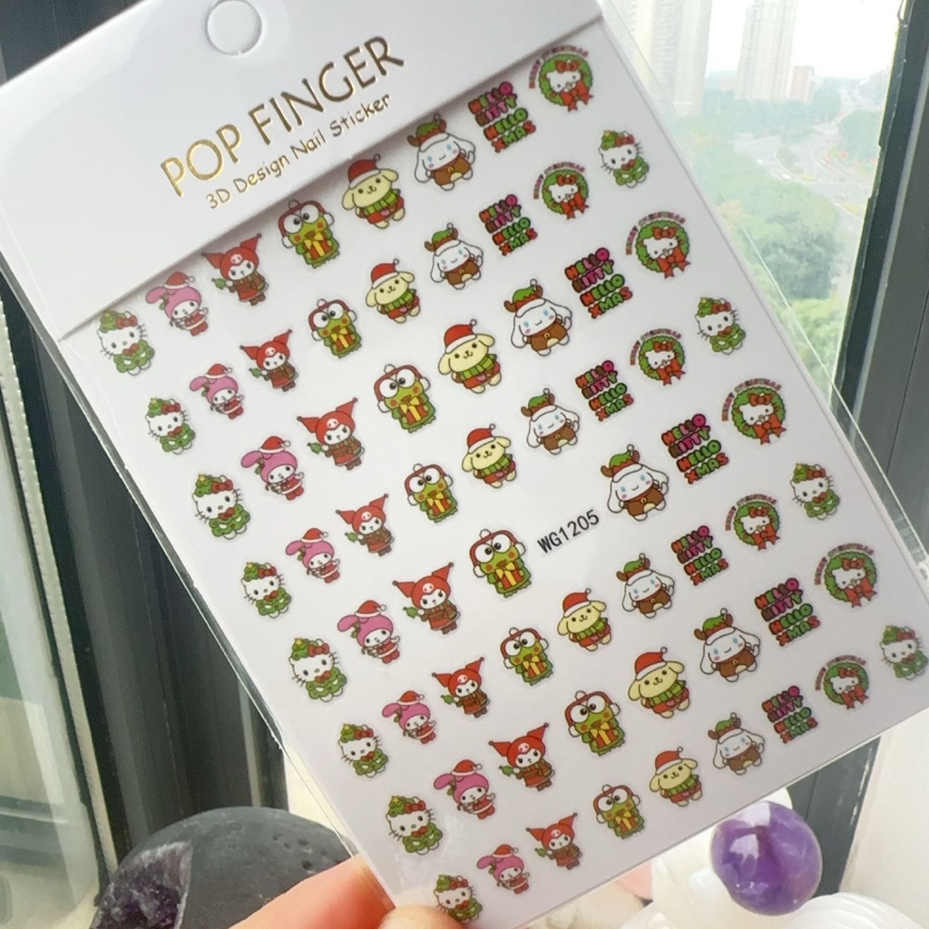 สติกเกอร์ติดเล็บ 3D ลายคิตตี้ คอลเลคชั่นวันคริสมาส มี 17 รูปแบบให้เลือก แผ่นละ 9 บาท