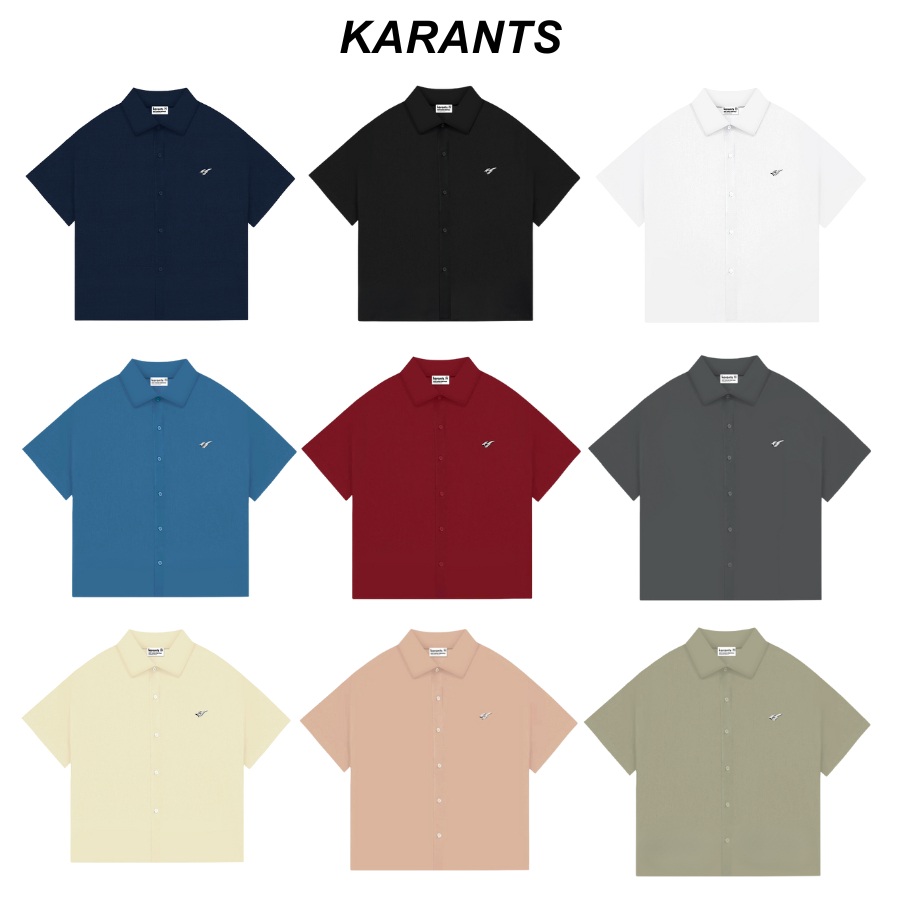 Karants เสื้อเชิ้ตสีพื้นโลโก้โลหะ ผ้า Cotton เย็น Premium Form Cropped Boxy สำหรับผู้ชายและผู้หญิง- 