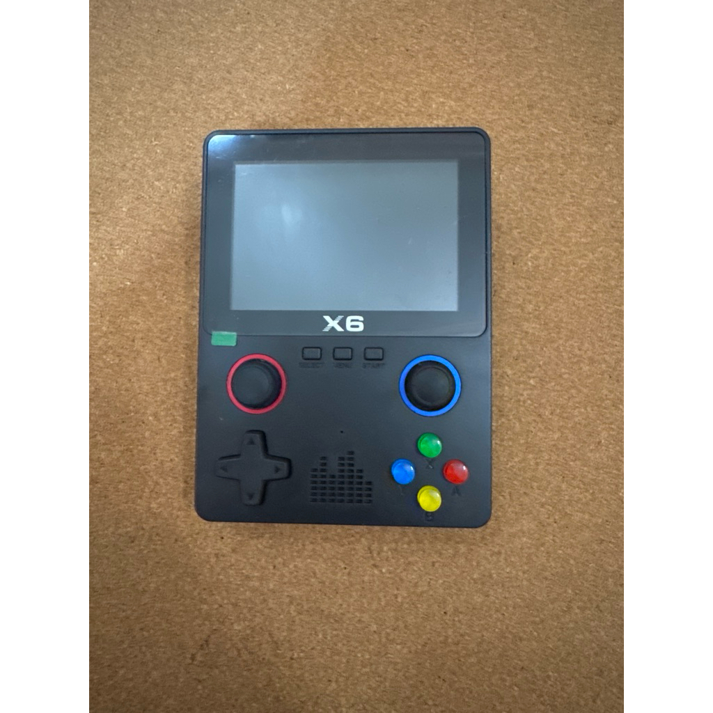 X6 portable handheld game machine playing classic games