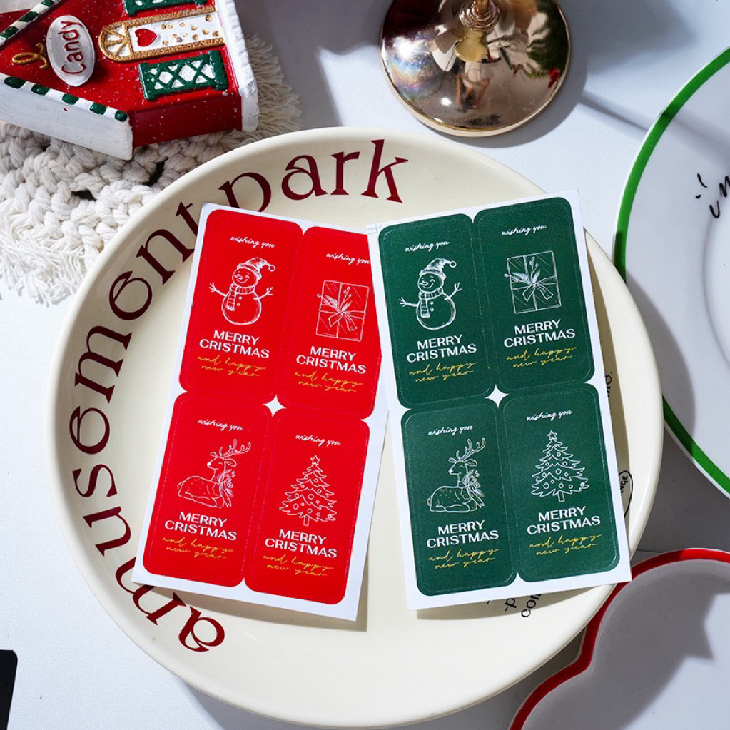 สติกเกอร์คริสต์มาส แพ็คละ 10 แผ่น ได้ทั้งหมด 40 ดวง แบบ 23