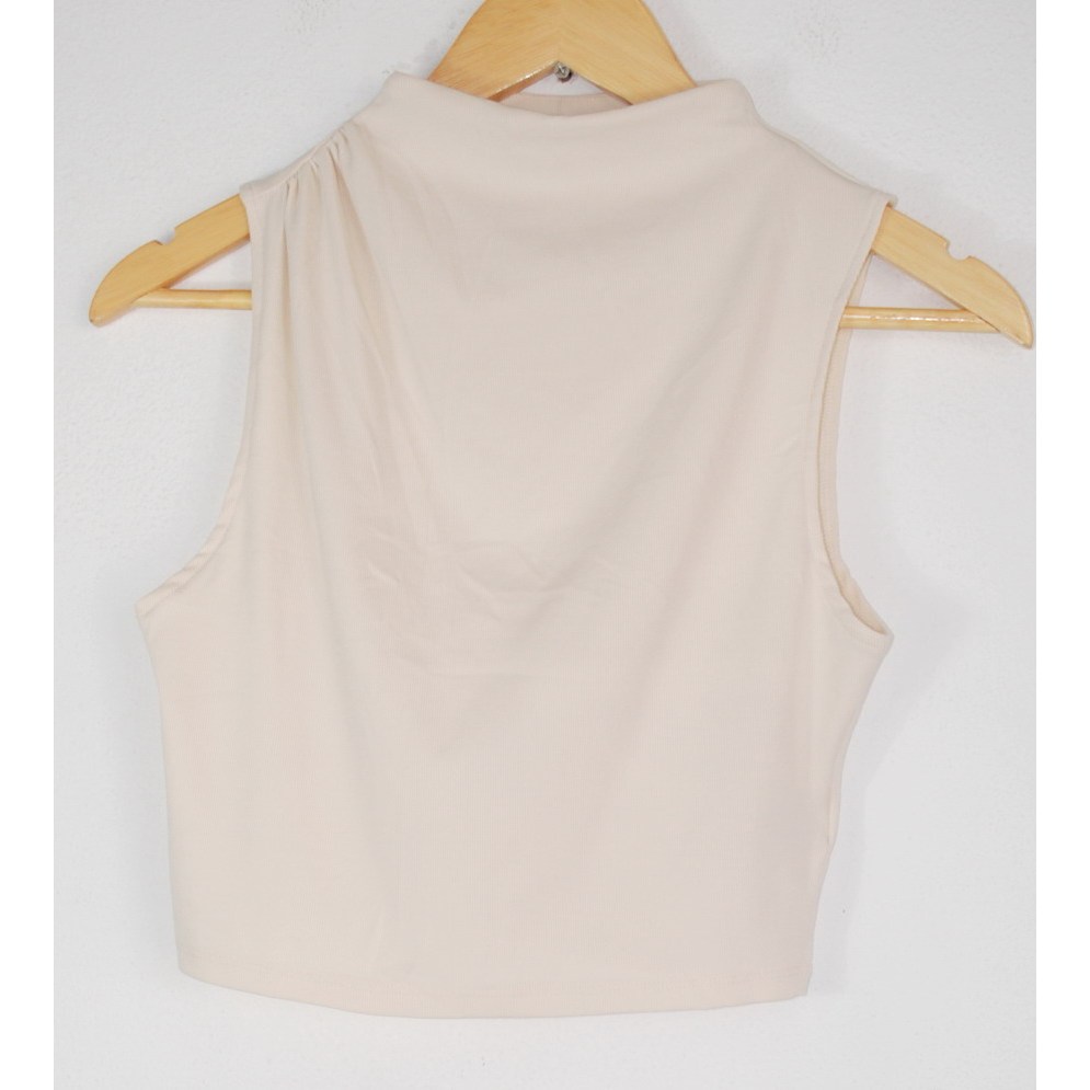 เสื้อครอป แขนกุด H&M มือ 2 คอเต่า สีครีม Size XS อก 30 นิ้ว ยาว 17 นิ้ว