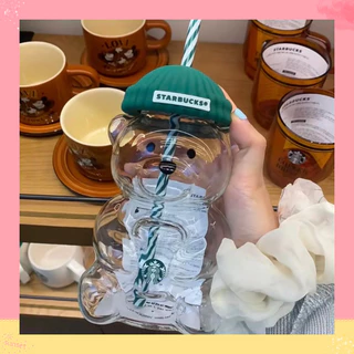 แก้วน้ำสตาร์บัคส์ รุ่นหมีแก๊งค์ หมวกเบเร่สีเขียว แก้วใสสวยงาม มีลายโลโก้ชัดเจน มาพร้อมหลอดดื่มสายสี