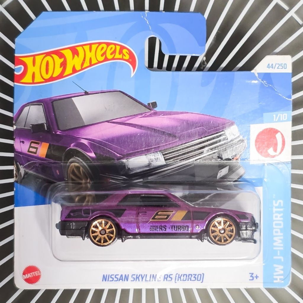 โมเดลรถเหล็ก Hotwheel แพ็คสั้น Nissan Skyline RS (KDR30) สีม่วง