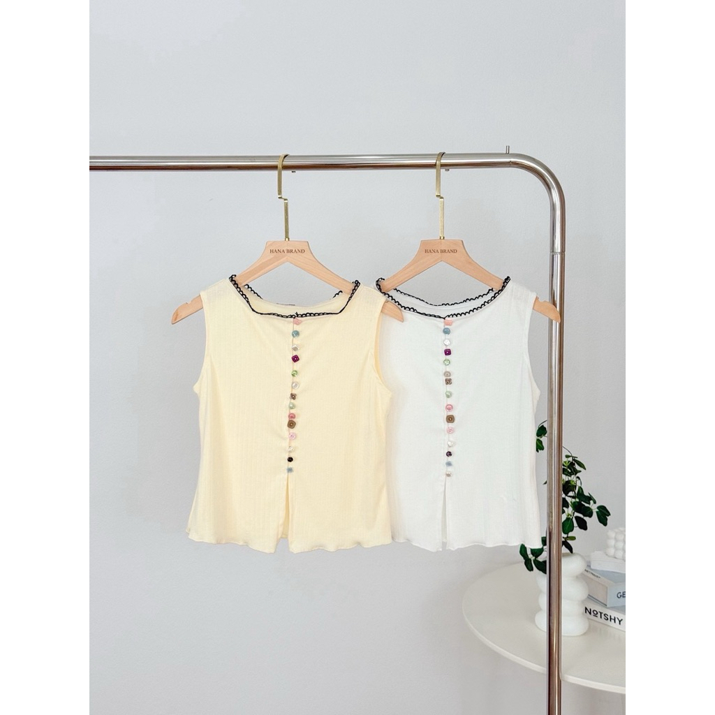 INFINITY : Macy Top (มาซี่) เสื้อแขนกุด สีหวานละมุน ดีเทลกระดุมหน้าหลากหลายรูปทรงสีสันสดใส