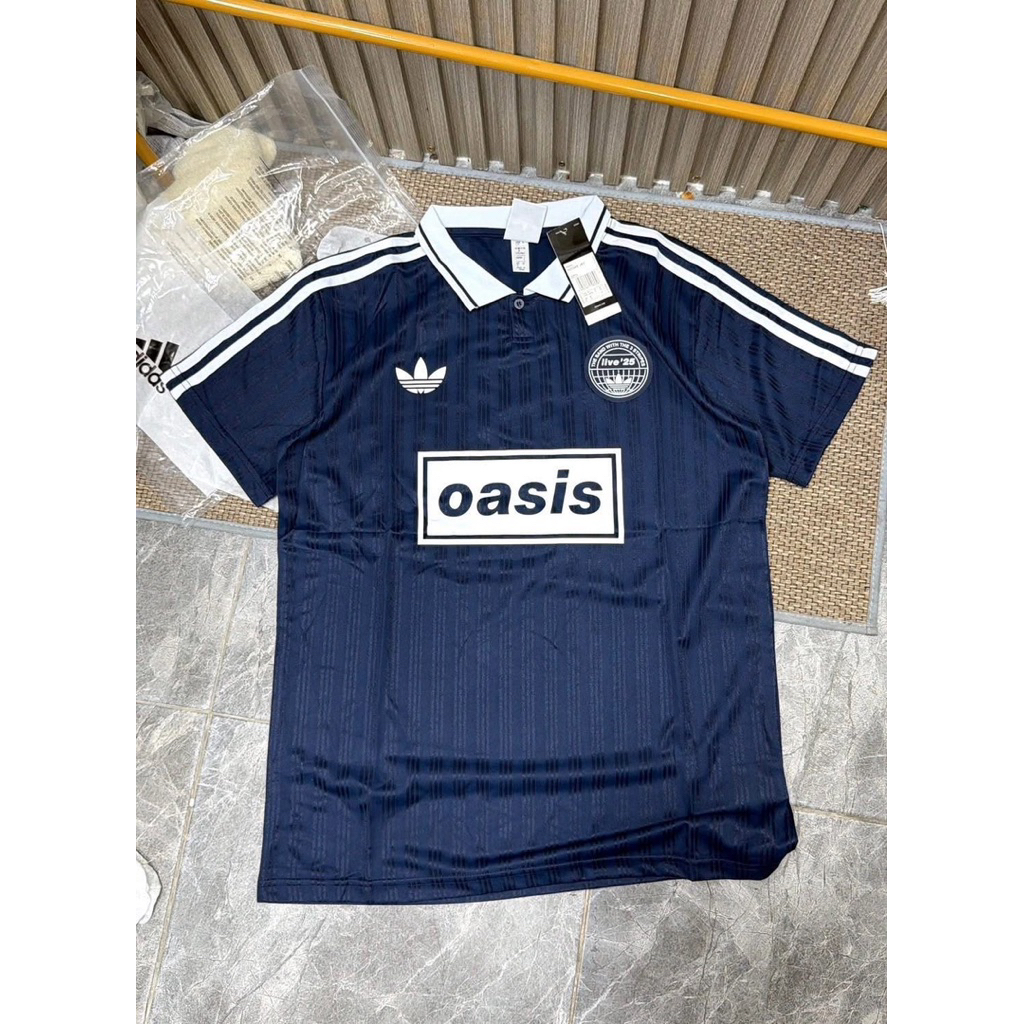 เสื้อบอลเนื้อผ้านุ่มลื่น แต่งคอปกสกรีนลายสกรีนโลโก้