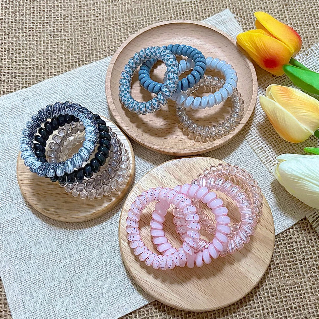 [5.5cm] ยางมัดผมสปริง ยางรัดผมสายโทรศัพท์ ราคาต่อ1เซต(1เซตได้4ชิ้นตามภาพ)