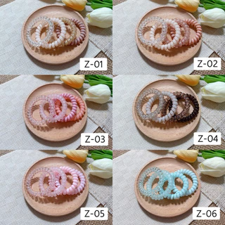 [5.5cm] ยางมัดผมสปริง ยางรัดผมสายโทรศัพท์ ราคาต่อ1เซต(1เซตได้4ชิ้นตามภาพ)