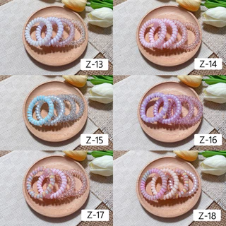 [5.5cm] ยางมัดผมสปริง ยางรัดผมสายโทรศัพท์ ราคาต่อ1เซต(1เซตได้4ชิ้นตามภาพ)