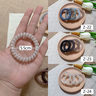[5.5cm] ยางมัดผมสปริง ยางรัดผมสายโทรศัพท์ ราคาต่อ1เซต(1เซตได้4ชิ้นตามภาพ)