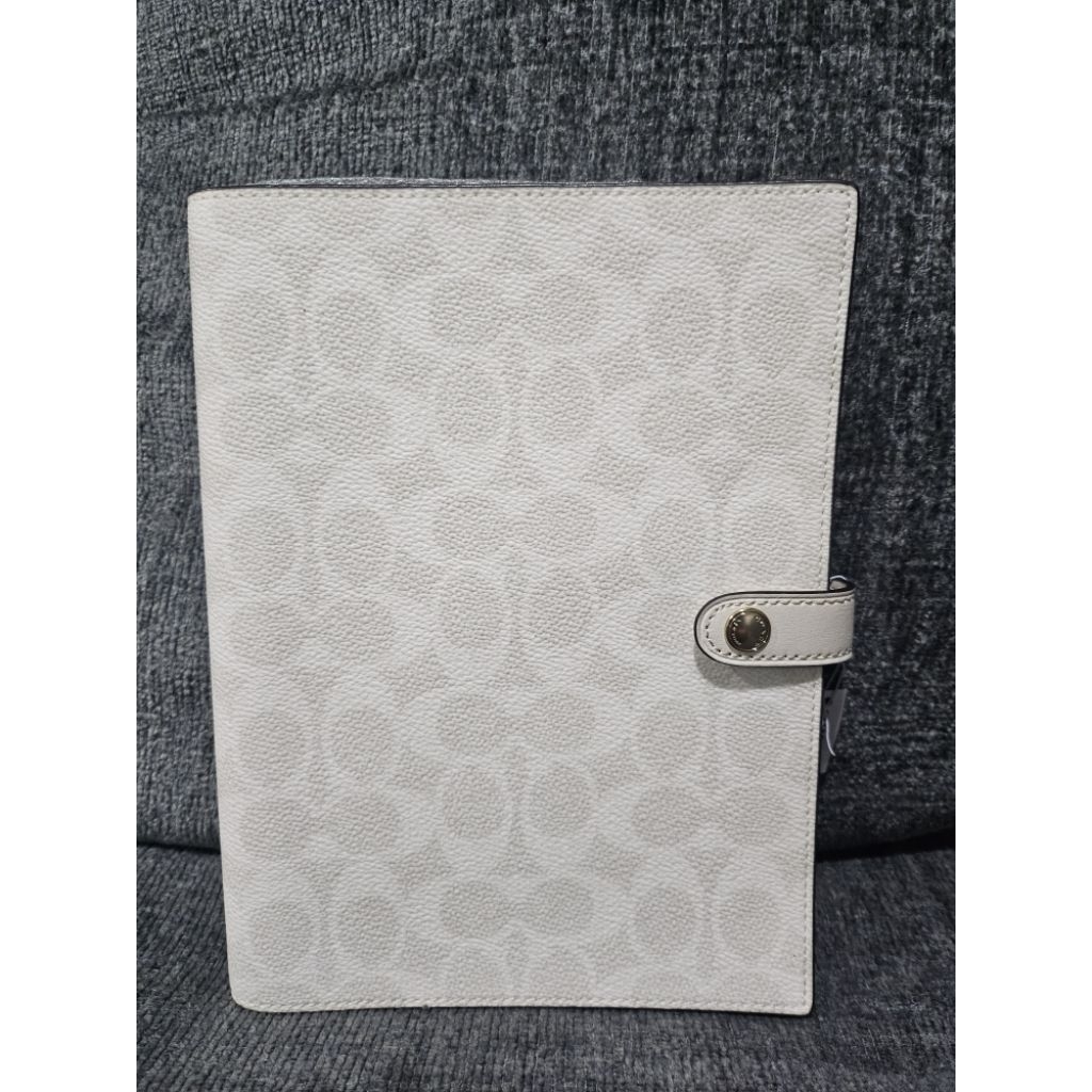Authentic coach notebook white color  brand new with tag.