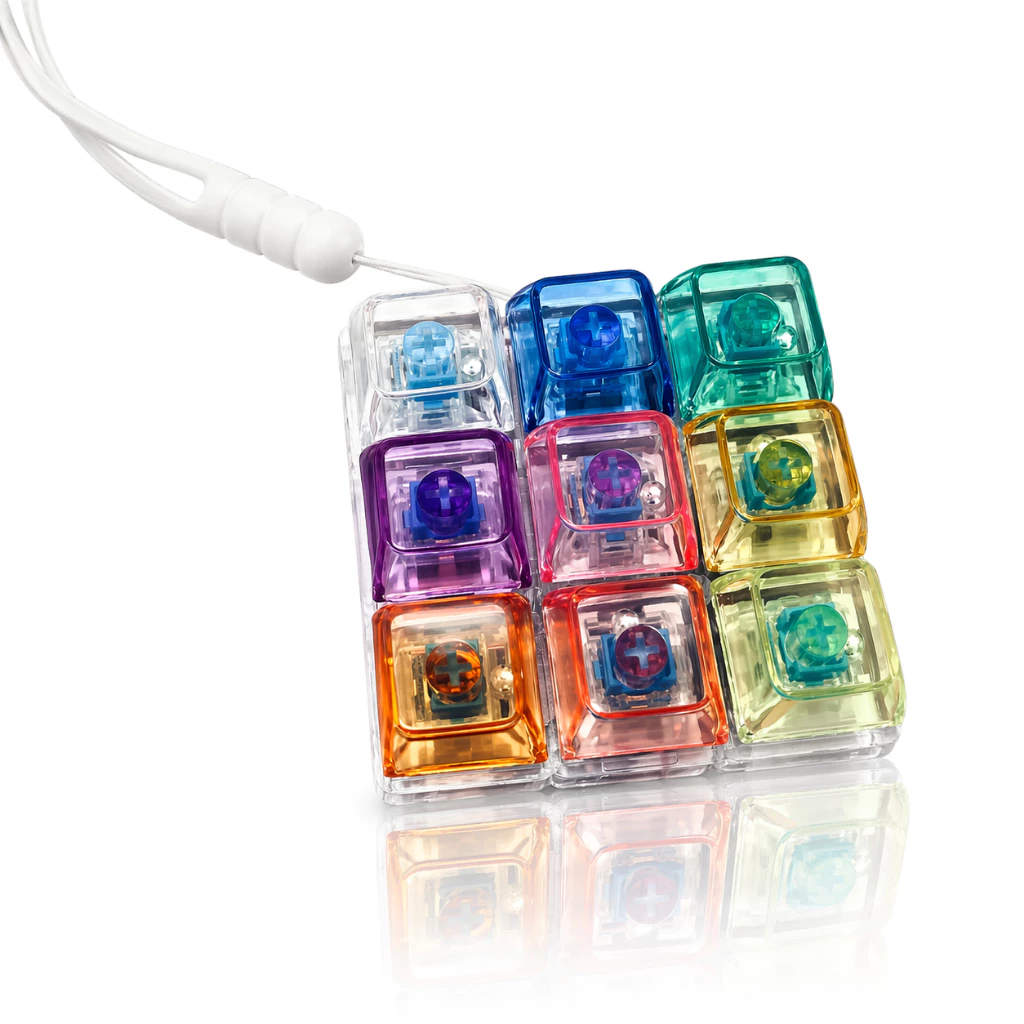 ของเล่นบรรเทาความเครียด ดีไซน์เก้าแป้นพิมพ์ มีไฟกระพริบ รุ้งมี 9 สี