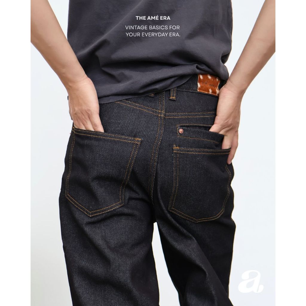 Ame.co.th | Ame Baggy Bootcut Raw Denim | กางเกงยีนส์ผ้าดิบ Baggy Bootcut ดีไซน์กระเป๋าเจาะ ป้ายหนังวัวลายแบมบิ YKK