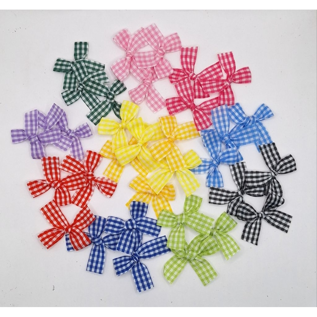 โบว์ผ้าลายสก๊อตขนาด13mm1ห่อบรรจุ50ชิ้นใช้ตกแต่งของต่างๆ