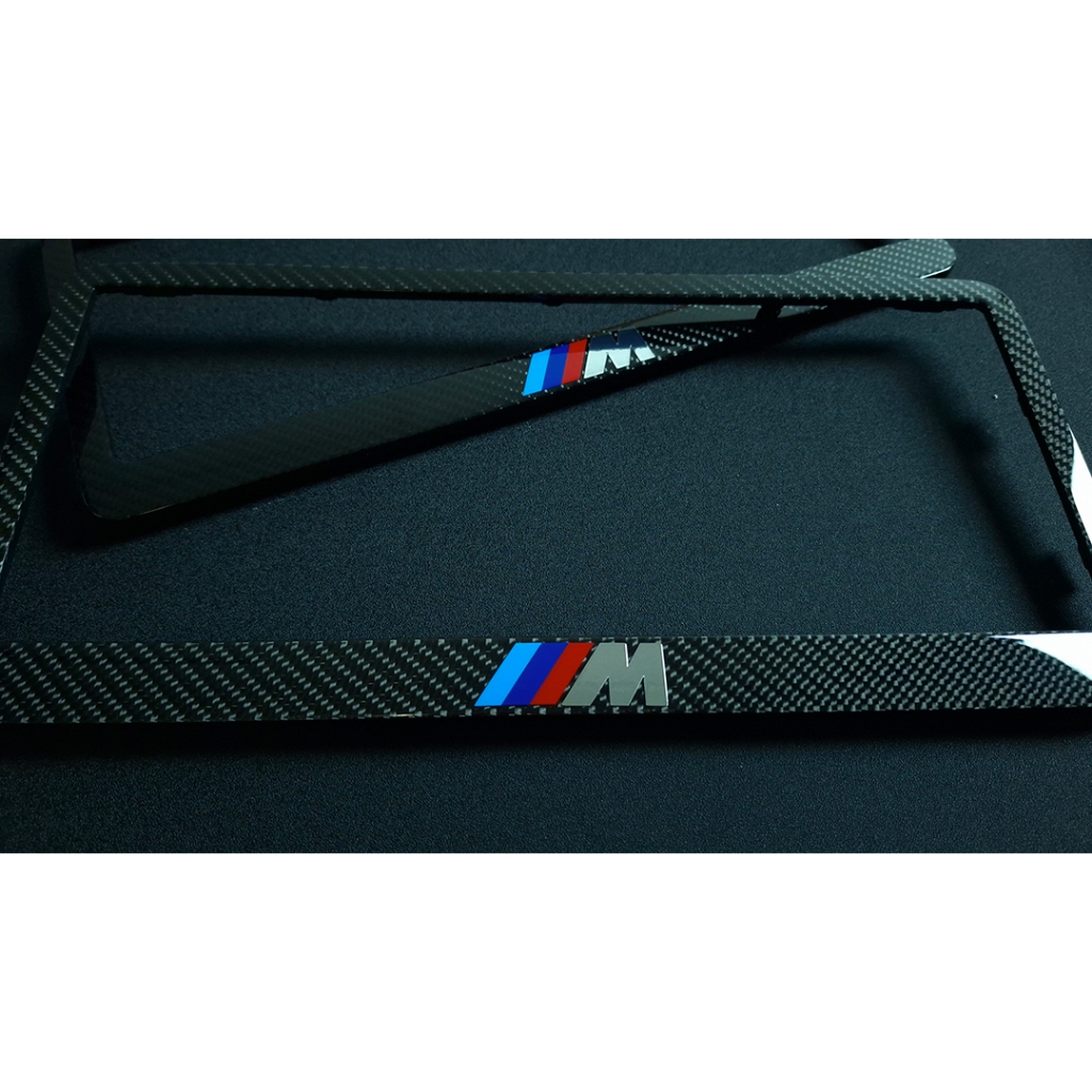 กรอบป้ายทะเบียน รถยนต์ BMW M-Logo หุ้มคาร์บอนแท้ ลาย2 จำนวน1คู่