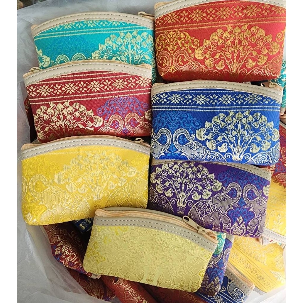 กระเป๋าขอบหนังลายช้างป่า