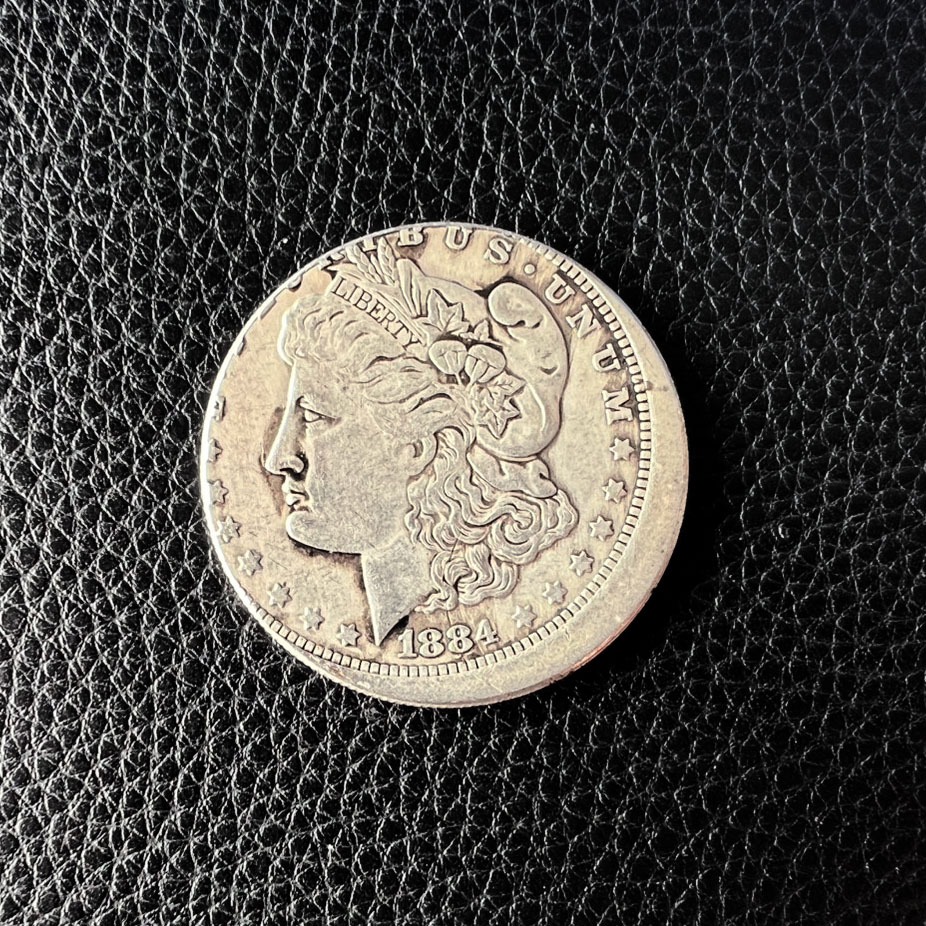 เหรียญดอลลาร์เงินปี 1884 ปั๊มเคลื่อน