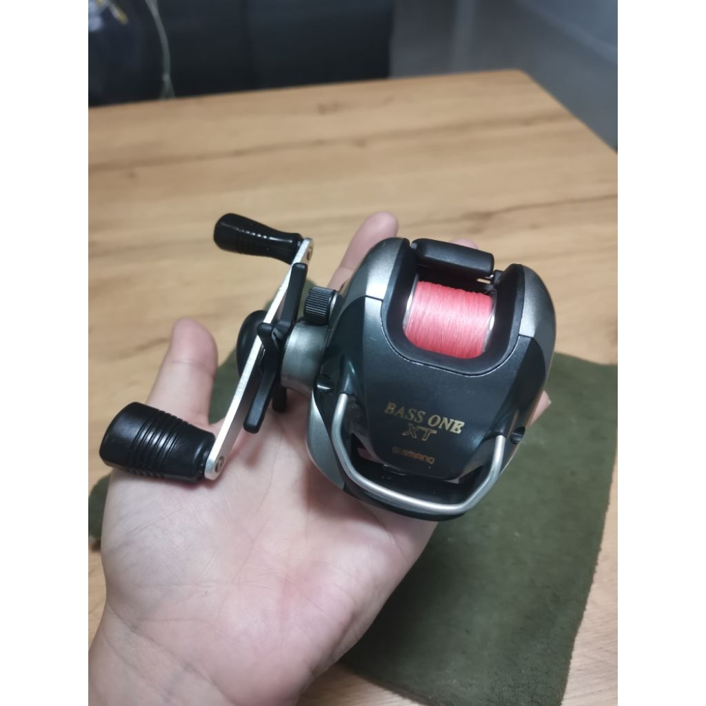 Shimano​ bass​ one​ xt​ หมุนขวา​