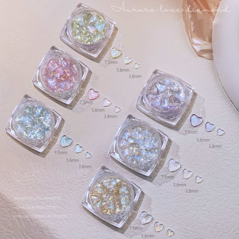 Nawoelite อะไหล่เล็บ เพชร คริสตัล อะไหล่เพชรตกแต่งเล็บ 6 สี รูปหัวใจ สีเรนโบว์สวยงาม สำหรับ DIY ทำงานเล็บ