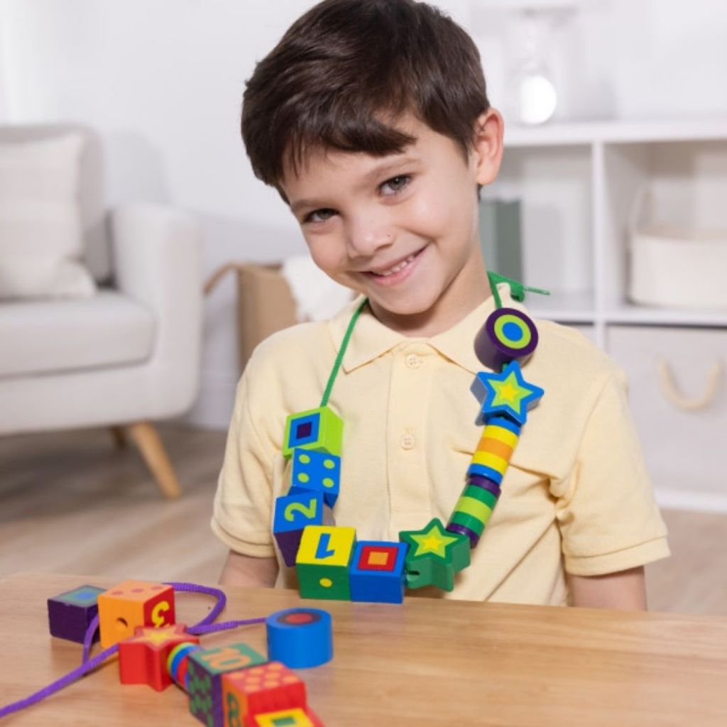 Melissa & Doug خرز لضم بالأشكال والألوان والأرقام — صورة 4
