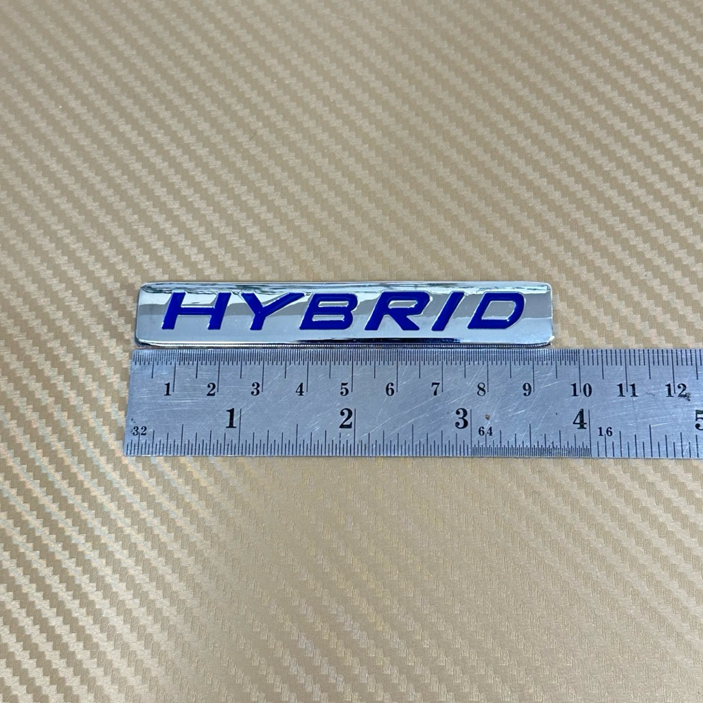 โลโก้  HYBRID งานโลหะ ขนาด* 1.5 x 9.5 cm ราคาต่อชิ้น