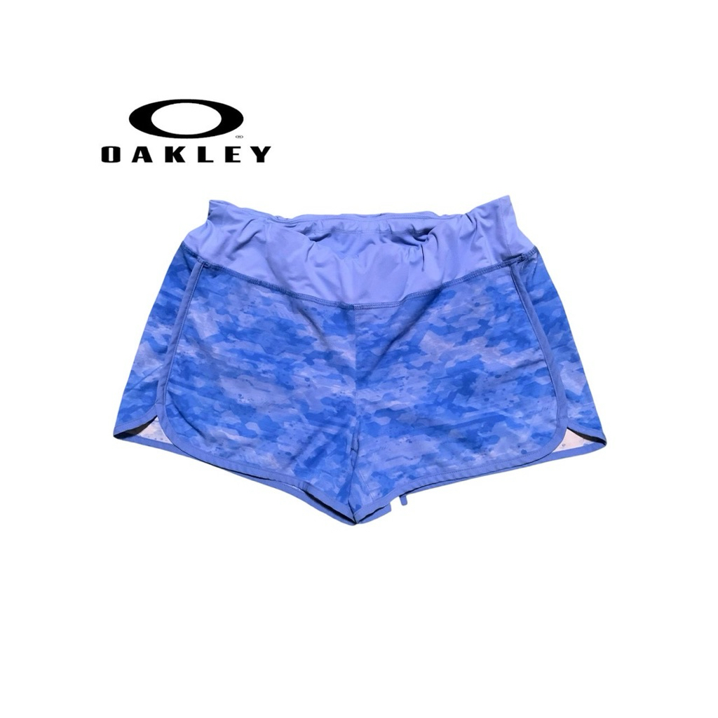Oakley กางเกงวิ่งผู้หญิง ไซส์ M สีฟ้า มีกระเป๋าซิป ผ้ายืด ใส่ออกกำลังกาย